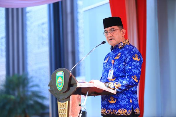 Pimpin Apel Gabungan Korpri Sumsel: Sekda Edward Candra Serahkan Santunan bagi 125 ASN Purna Tugas